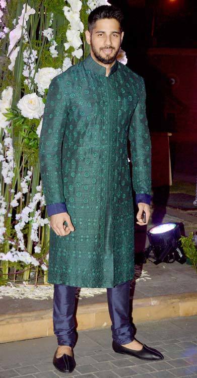 #15 - In a Classy and Cultural Royal Green Sherwani